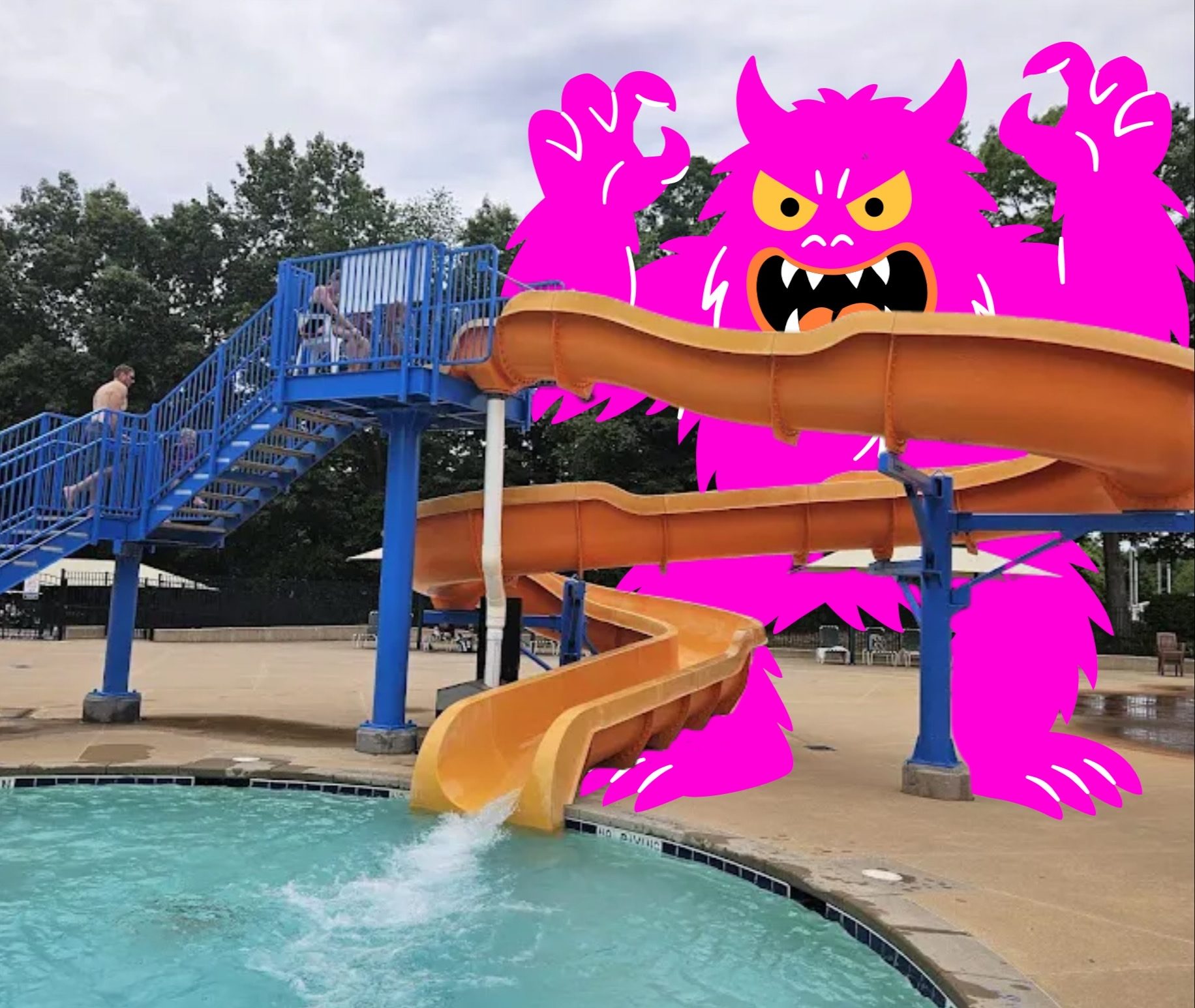 Big fluffy pink monster behind the waterpark slide